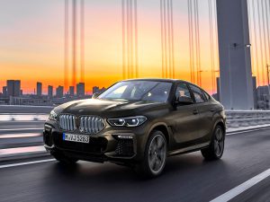 P90356689 highRes the new bmw x6 drivi